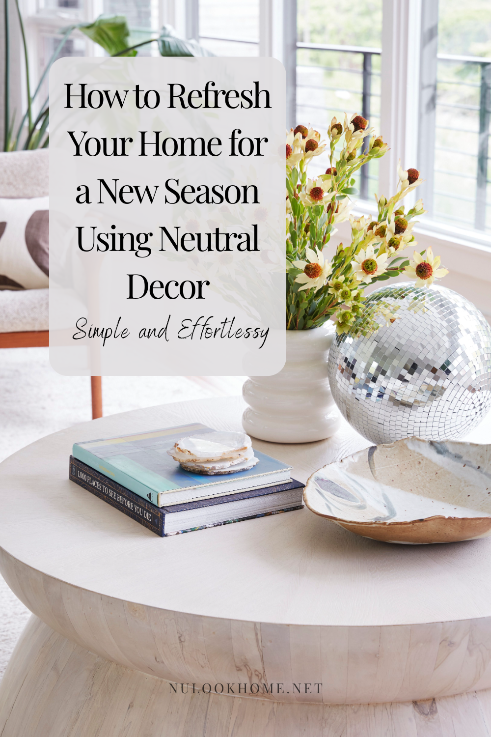 Neutral seasonal home decor featuring layered textiles, natural greenery, warm beige accents, and minimalist storage solutions for a clutter-free refresh.